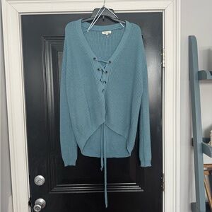 Miracle • Blue V-Neck Sweater with Lace-Up Detail
